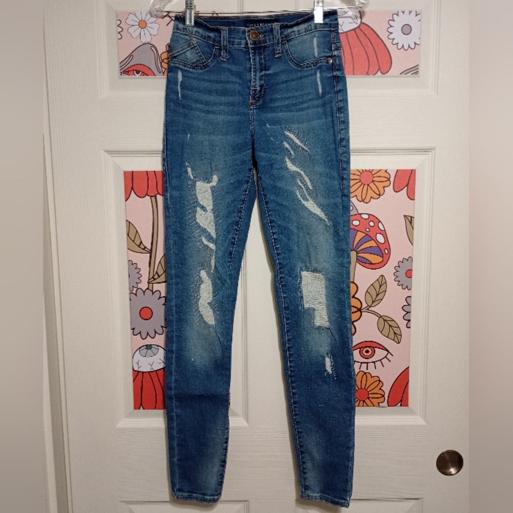 Rock & Republic Dark Blue Ripped Skinny Jeans